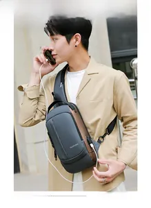 Sac à bandoulière pour hommes avec port de charge USB externe et compartiments zippés