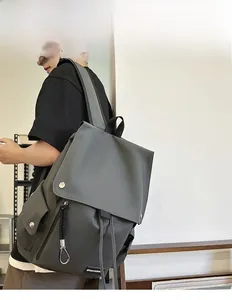 Deep grey large capacity waterproof nylon backpack shown on a 175cm male model