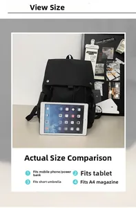 Detail view of large black nylon backpack featuring flap closure and side storage pockets