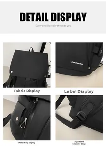 Detail view of the black nylon backpack showing logo plate, metal buckle, and adjustable straps