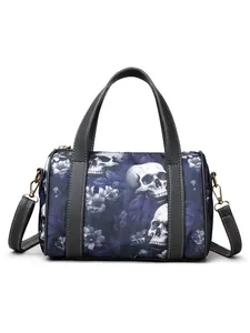 Detailed macro view of skull and floral print on a gothic style boston crossbody bag