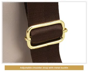 Macro shot of adjustable golden metal buckle and textured brown shoulder strap detail