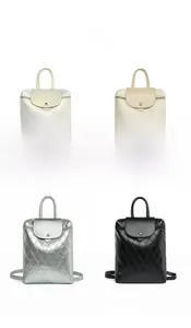 Quilted backpack collection in white, cream, silver, and black finishes for women
