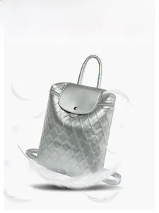 Detail showing lightweight silver quilted backpack weighing only 0.33kg for daily travel