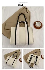 Vues détaillées d'un sac cabas en toile minimaliste noir et blanc avec doubles sangles
