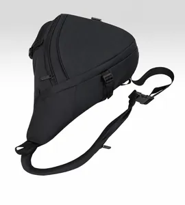 Detail view of black multi-pocket crossbody bag with adjustable strap and buckle