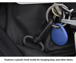 Detail of interior plastic swivel hook for keys and cards with durable nylon webbing
