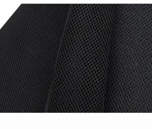 Detail of breathable honeycomb mesh fabric on the back of a casual crossbody chest bag