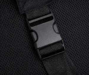 Detail of high-strength black plastic buckle and nylon strap on breathable mesh fabric
