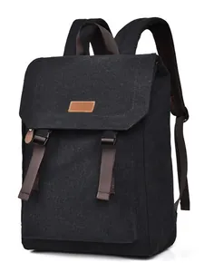 Minimalist black canvas backpack with flap cover and brown buckle straps for students