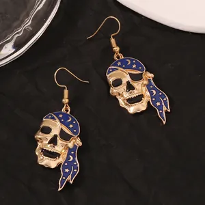 Retro pirate skull hook earrings with blue enamel bandana and gold finish for Halloween
