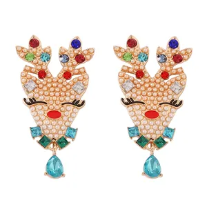 Luxurious reindeer stud earrings with pearls, colorful crystals and blue water drop charms