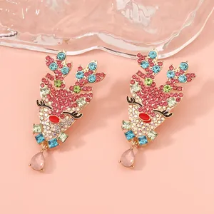 Colorful rhinestone reindeer earrings with a pink crystal droplet for festive style