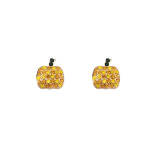 Detailed view of pumpkin stud earrings featuring multi-color sparkling rhinestones