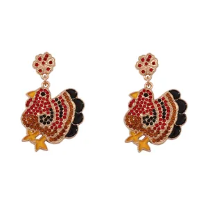 Sparkling Thanksgiving turkey drop earrings with colorful rhinestones in gold setting