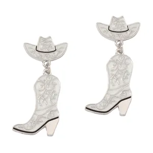Western style cowboy hat and boot earrings in silver metal with white enamel detailing