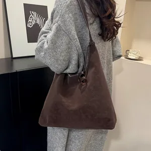 Retro oversized coffee brown tote bag with contrast stitching and knot detail on shoulder strap