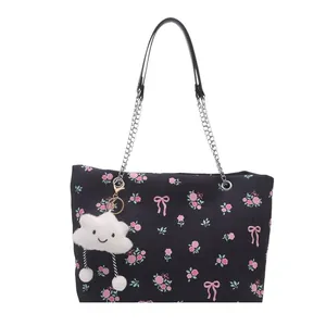 Floral bucket tote bag with pink rose and bow prints featuring a cute cloud charm
