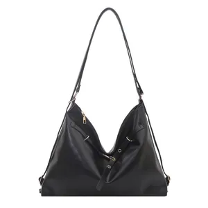 Retro black PU leather hobo bag with adjustable buckle straps and metallic eyelets