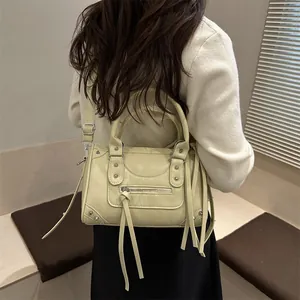Vintage cream yellow studded Boston bag with tassels and shoulder strap for women