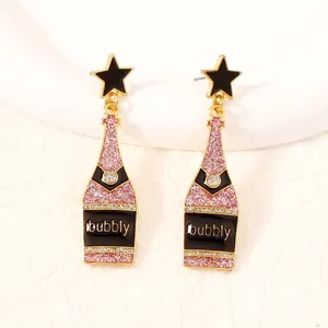 Fashion champagne bottle earrings with pink glitter stars and bubbly enamel design