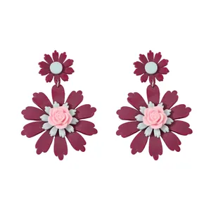 Deep burgundy sunflower earrings with pink rose detail and matte resin finish