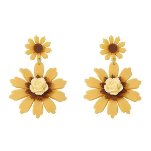 Vibrant sunflower drop earrings with yellow petals and white rose center detail