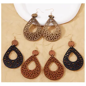 Three pairs of bohemian water-drop wooden earrings with leopard pattern cutouts