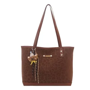 Matte leopard print tote bag with bear charm and golden fashion plaque for women