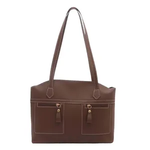 Brown faux leather shoulder tote bag for women with dual front zipper pockets and gold hardware