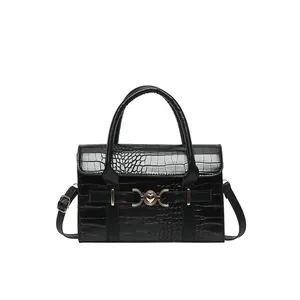Classic black crocodile pattern leather handbag with gold heart buckle and top handle
