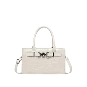 Off-white crocodile pattern handbag with silver heart buckle and adjustable shoulder strap