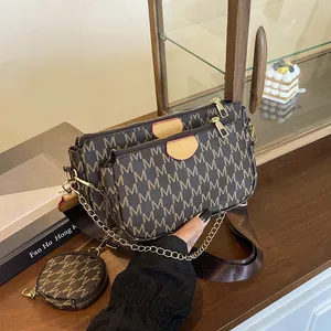 Brown monogram crossbody bag set with wide strap and detachable round coin purse