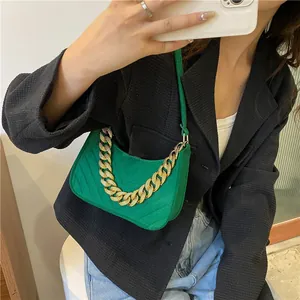 Green felt underarm bag with V-quilted pattern and gold chain strap for women