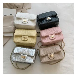Collection of quilted chain crossbody bags in six various colors on elegant fabric
