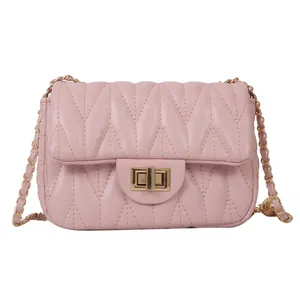 Elegant light pink quilted chain shoulder bag with gold twist lock on white background