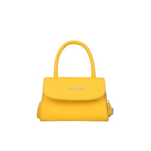 Minimalist bright yellow PU leather small square bag with top handle and crossbody strap