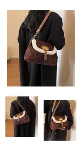 Detail view of vintage plaid shoulder bag with soft fleece trim and gold hardware