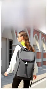 Detail of waterproof travel backpack with adjustable purple strap and buckle