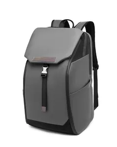 Detail of dark grey waterproof backpack featuring a buckle closure and matte texture