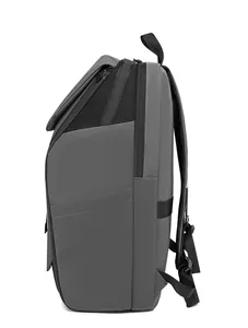 Detail view of the multi-layer zipper structure on a dark gray waterproof business backpack