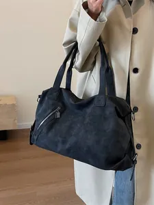 Large dark grey tote bag with matte texture and dual handles for women commuting