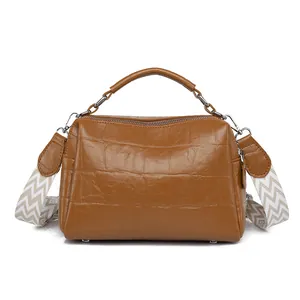 Vintage brown crocodile embossed leather satchel with wide printed shoulder strap