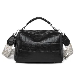 Vintage black crocodile embossed hobo bag with trendy patterned wide shoulder strap