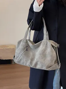 Classic oversized gray leather tote bag with vintage texture for stylish women's daily commute