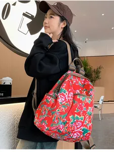 Detailed view of large capacity floral backpack with traditional Chinese peony pattern