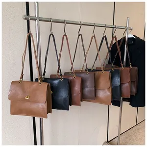 Selection of vintage tote bags with textured PU leather and golden twist-lock closures