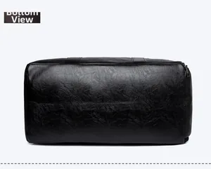 Detalle del fondo impermeable de cuero PU negro del bolso de viaje y gimnasio unisex
