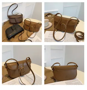 Vue détaillée des sacs de selle vintage en cuir mat marron, noir et camel avec boucle
