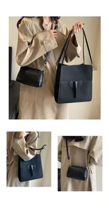 Detail view of black matte leather tote and camera bag set with elephant ear design